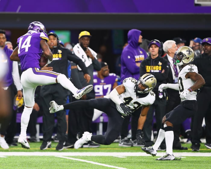 Jan 14, 2018; Minneapolis, MN, USA; Minnesota Vikings wide receiver Stefon Diggs catches the game winning touchdown as New Orleans Saints safety Marcus Williams (43) misses the tackle and collides with cornerback Ken Crawley (20) in the fourth quarter at U.S. Bank Stadium. Mandatory Credit: Mark J. Rebilas-USA TODAY